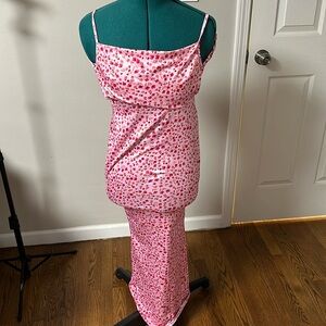 pink dress , draped neckline (it doesn’t fit the mannequin)